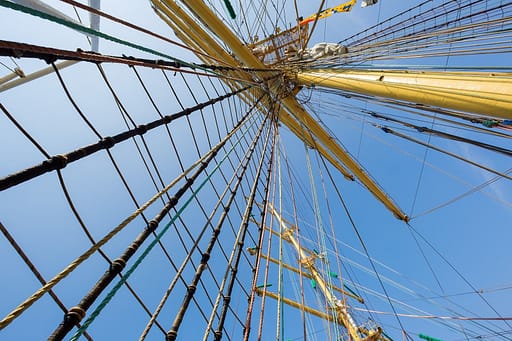Rigging and masts of an old large sailing ship. This serves to explain how tension is seen in Rolfing fascia therapy.