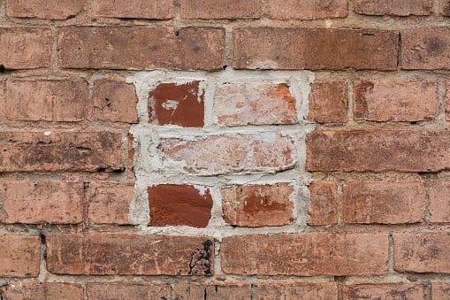 repaired brick wall as an image for different levels of healing
